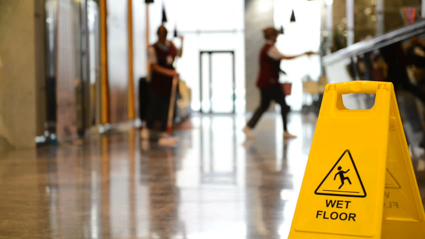 Yellow Warning Sign Wet Floor Sign Showing Warning Of Caution Wet Floor And Workerw Cleaning Hall Floor Of  Business Building